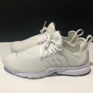 All white Nike Prestos